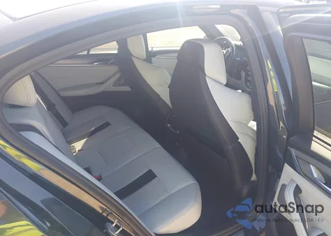 2018 BMW M5 z USA, uszkodzony, nr VIN WBSJF0C54JB282104